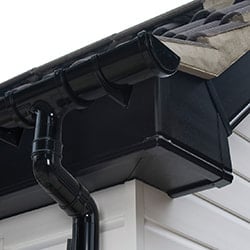 Black fascia and soffit can be extremely effective on white rendered houses