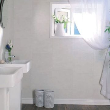 whitestone large tile 8mm bathroom panel fitted in a bathroom